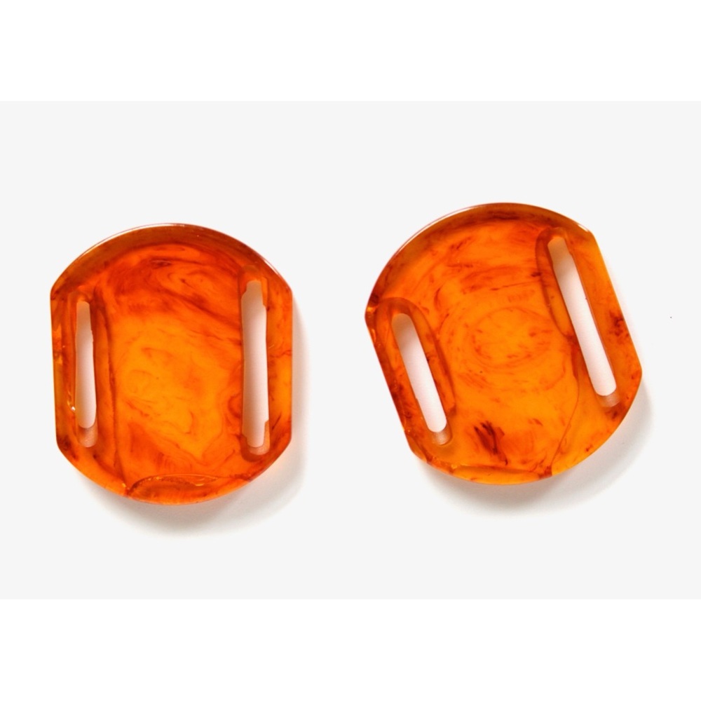 1930s butterscotch Bakelite sash buckles